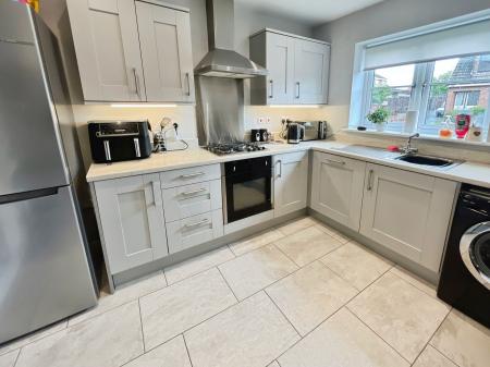4 bedroom Detached house for sale in The Leys, Newhall, DE11