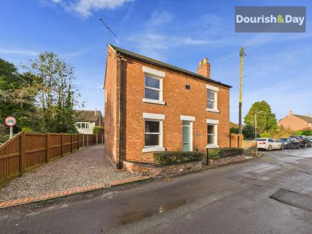 Front Elevation & Driveway