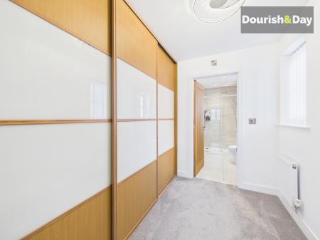 Bedroom 1 Walk Through Dressing Room