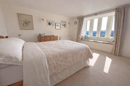 Bright and serene bedroom retreat (1).jpg