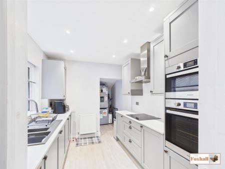 Kitchen/ Utility Area