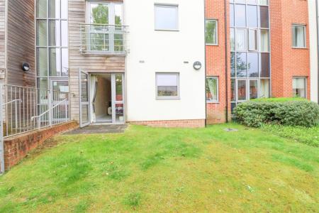 Door From Lounge To Communal Grounds