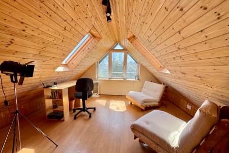 Boarded Attic (accessed by retractable ladder)