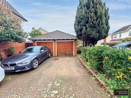 GARAGE WITH PARKING IN FRONT