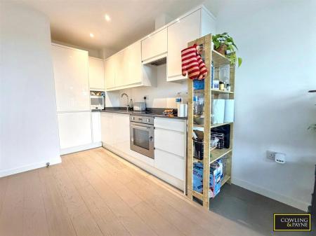 OPEN PLANNED LOUNGE/KITCHEN