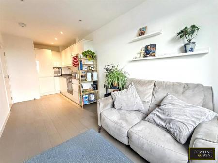 OPEN PLANNED LOUNGE/KITCHEN