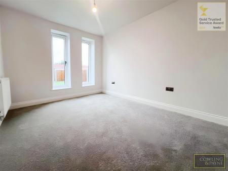 SECOND BEDROOM