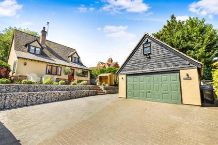 Double Garage With Gated Driveway