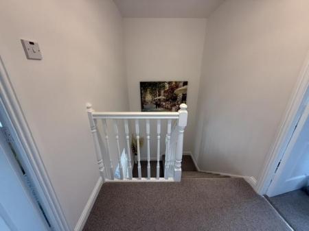 TO THE FIRST FLOOR