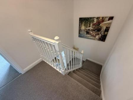 TO THE FIRST FLOOR