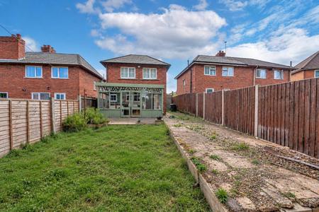 Lived-In Suburban Garden with Conservatory.png