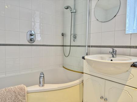 Family Bathroom with shower over bath