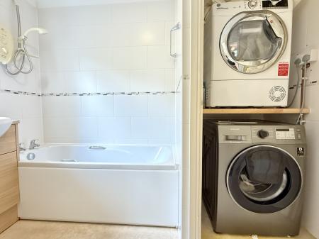 Utility Cupboard in Bathroom
