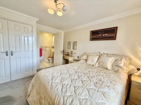 Master Bedroom with Fitted Wardrobes and En Suite