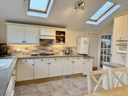 Kitchen with vaulted ceiling