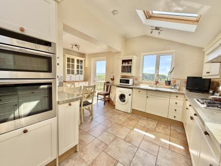 Kitchen with vaulted ceiling