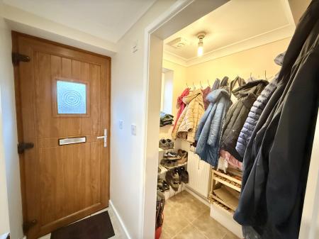 Cloaks Cupboard (Former WC)