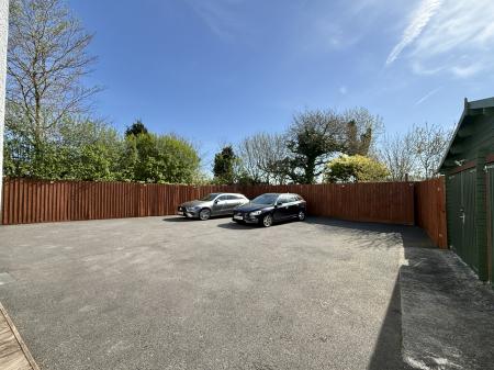 Ample Gated Parking & Double Garage.