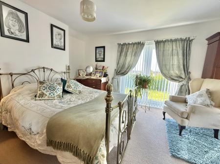 Spacious master with Juliet balcony