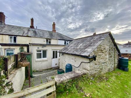 Rear with Stone Storage Shed