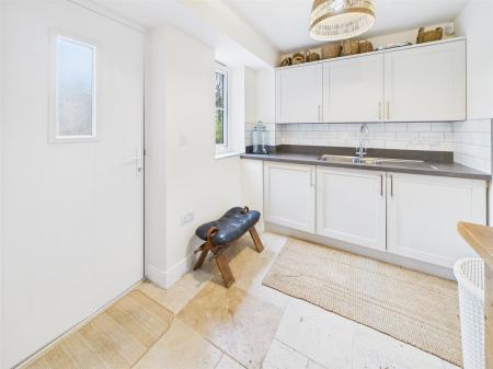 Utility Room Leading Outside