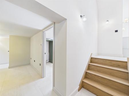 Entrance Hallway Leading To Kitchen & Utility Room