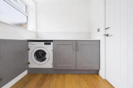 Utility Room With WC