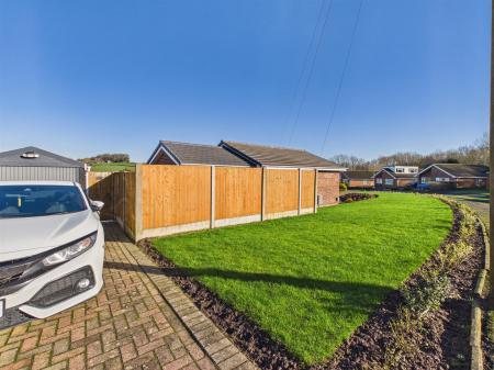 Rear Drive And Garage