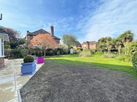 Generous Gardens wrapping round the property