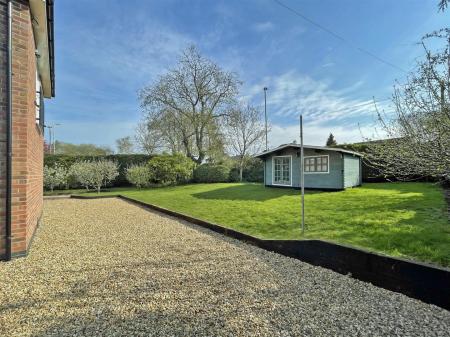 Generous Gardens wrapping round the property