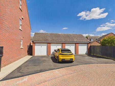 Single Garage & Driveway - Second from the right h
