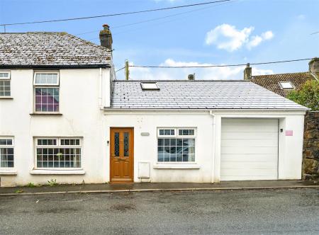 Western Cottage Front b;.jpg