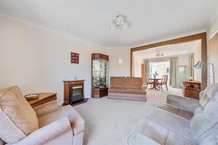 Meera Sitting Room Through.jpg