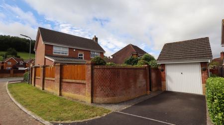 Garage and rear elev