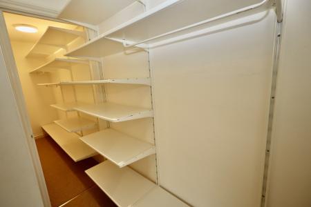 Walk-in cupboard off