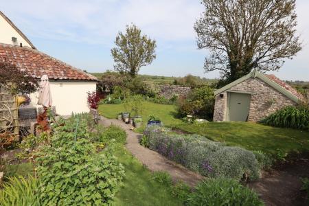 Garden and outbuildi