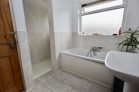 Bathroom with separa