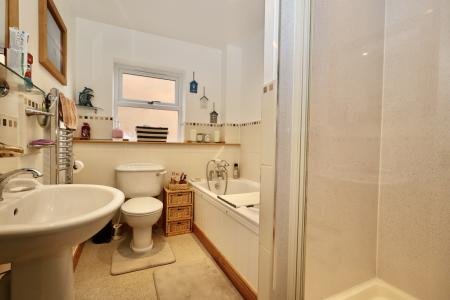 Bathroom with separa