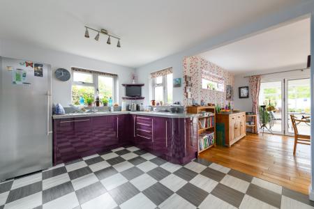 Kitchen opening into