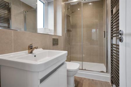 EN-SUITE SHOWER ROOM TO BEDROOM ONE