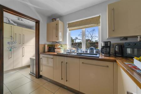 KITCHEN AND UTILITY ROOM