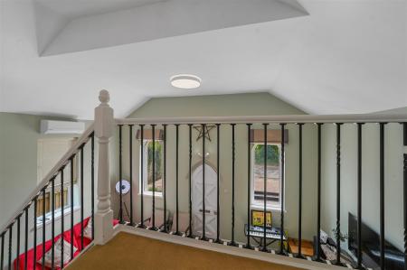 MEZZANINE LANDING TO BEDROOM ONE