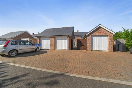 GARAGE AND DRIVEWAY PARKING