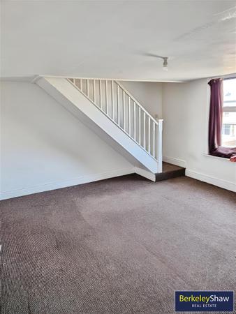 Bedroom with mezzanine office