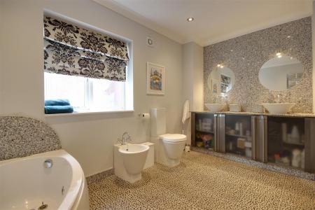 En-suite bath and shower room