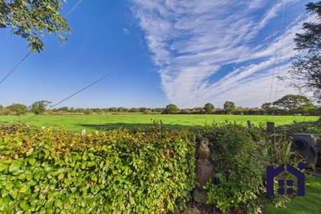 Open countryside to the rear