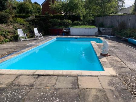 Pool shown in Summertime