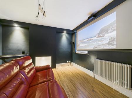 DINING/CINEMA ROOM