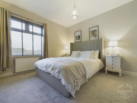 FRONT MASTER BEDROOM