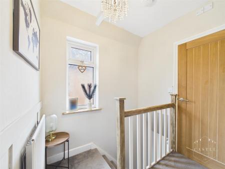 FIRST FLOOR LANDING